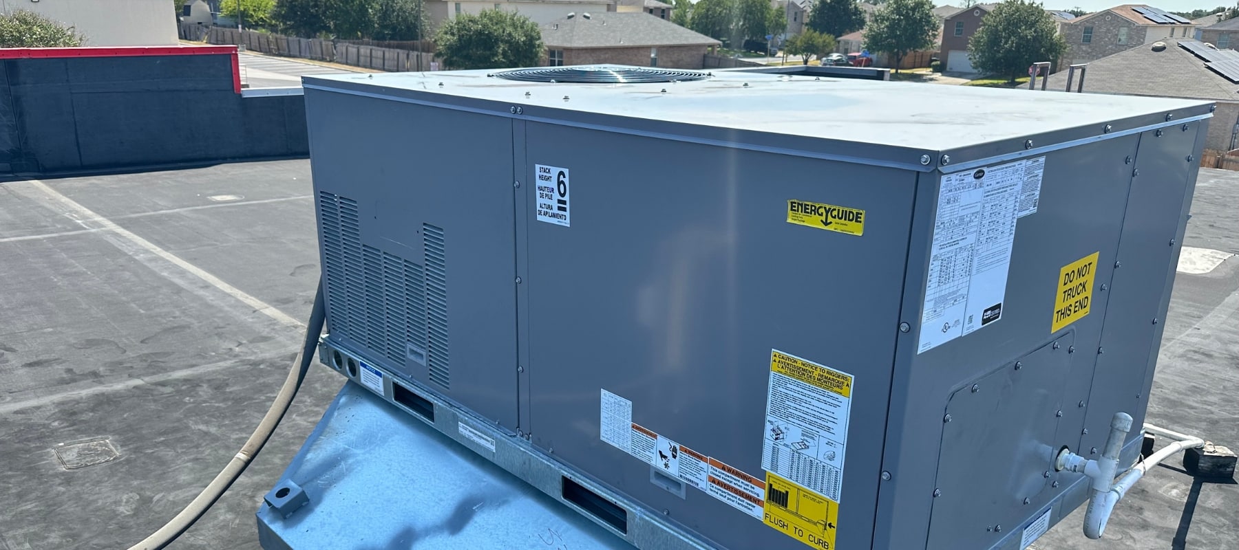 commercial ac unit on a business's roof